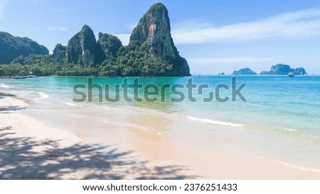 Blue sea with beautifull cliff in Thailand. Aerial Island view of heavenly white sand beach. Railay beach. Hidden Island.