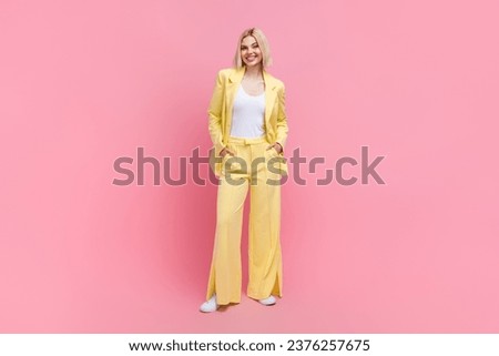 Full length photo of pretty cheerful person put hands pockets posing isolated on pink color background