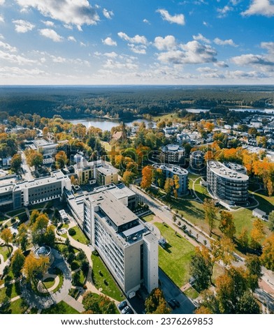 Druskininkai in autumn colours, drone picture of multi coloured trees in most beautiful city of Druskininkai in Lithuania Royalty-Free Stock Photo #2376269853