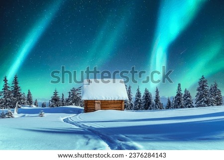 A picturesque winter tableau showcasing a wooden cottage and snow-covered conifers in the mountains. Aurora borealis. Northern lights in winter forest. Christmas holiday and winter vacations concept