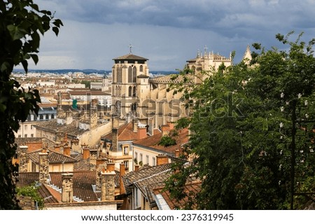 Lyon's Saint-Jean-Baptiste Cathedral from the Montée de Chazeaux staircase on a cloudy day Royalty-Free Stock Photo #2376319945