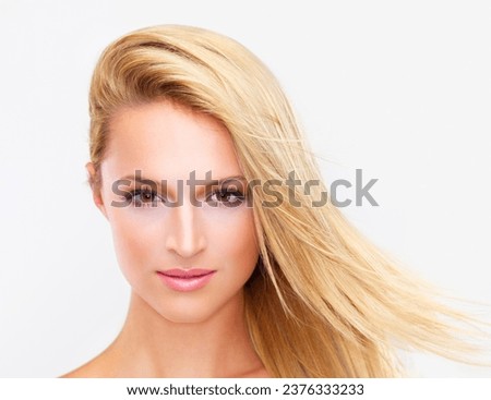 Portrait, skincare and hair of a woman closeup in studio on a white background for natural wellness or cosmetics. Face, beauty and cosmetics with a confident young model at the salon for dermatology