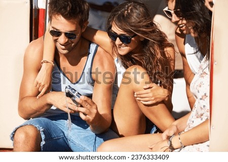 Photography, travel or people with camera on road trip for a fun summer holiday vacation together. Sunglasses, show or group of happy friends with photo on an adventure for memory or freedom in van