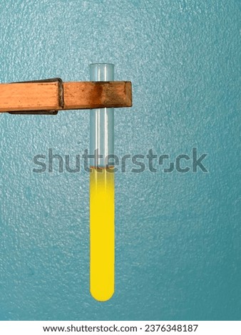 The presence of reducing sugars is indicated by the appearance of reddish-brown precipitate in test tubes. Royalty-Free Stock Photo #2376348187