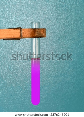 The presence of reducing sugars is indicated by the appearance of reddish-brown precipitate in test tubes. Royalty-Free Stock Photo #2376348201