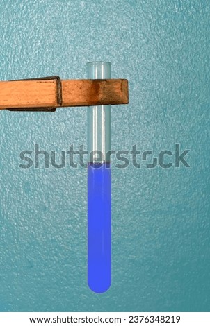 The presence of reducing sugars is indicated by the appearance of reddish-brown precipitate in test tubes. Royalty-Free Stock Photo #2376348219