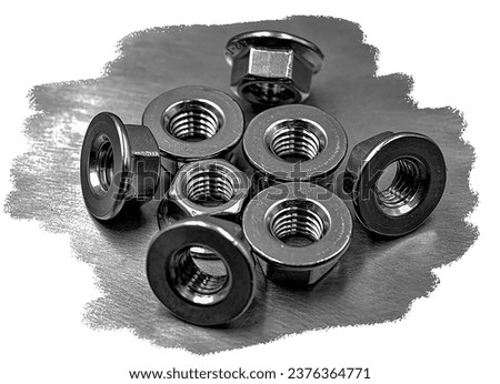DIN 6923 Flange nut group close up on stainless steel background