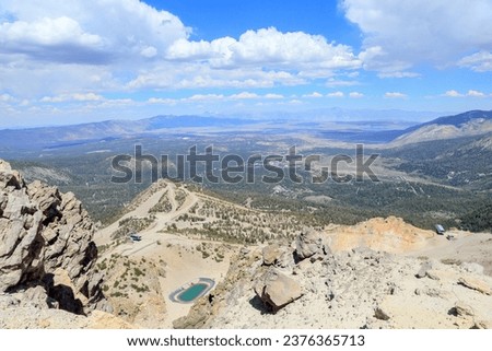 A vast view from the top of Mammoth mountain in Mammoth Lakes, California during a summer time. Royalty-Free Stock Photo #2376365713