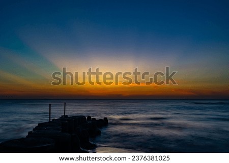 Sunset on the coast, using a slow shutter speed