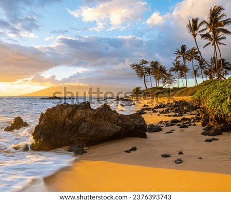 Sunset on The Golden Sand of Mokapu Beach, Wailea, Maui, Hawaii, USA Royalty-Free Stock Photo #2376393743