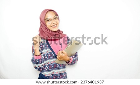 Young asian girl teen student, holding books isolated on white background. Education in high school university college concept. Mock up copy space