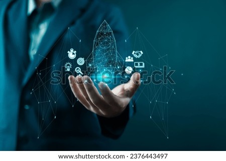 businessman showing Startup business concept Network connection icons on modern virtual interface rocket, idea, growth, digital, technology, concept, unicorn, company, future, success, global,  
 Royalty-Free Stock Photo #2376443497