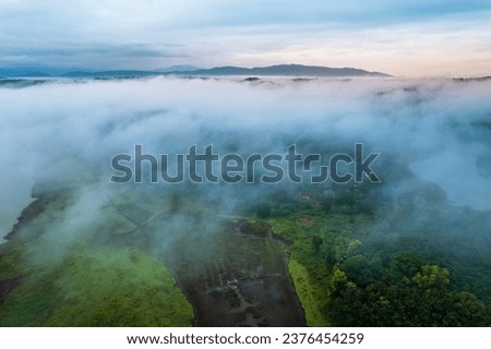 Stunning view of mountain under mist, Aerial shot of foggy morning with forest view, Kannur nature landscape scenery