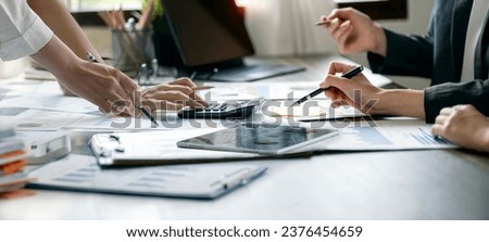 Group of young creative working together. Creative business people meeting in office. Royalty-Free Stock Photo #2376454659