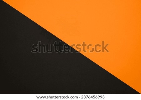 Black and orange modern abstract background. Autumn background. Two-color texture. Design. Template. 