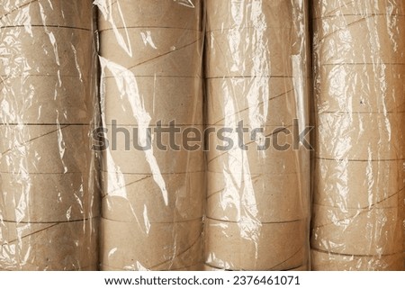 Packaging Tape core waste recycle bin paper box for reuse rolls of transparent packaging, adhesive tape core, horizontal stock photo