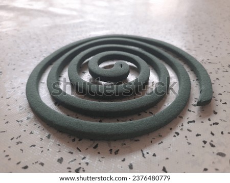 Mosquito coils in green with white and black background
