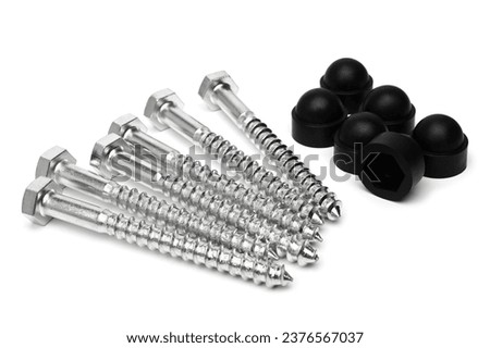 Screws with plastic cap covers on white background Royalty-Free Stock Photo #2376567037