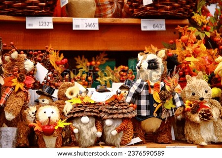 Figurine of a cat, a brownie, a wolf.Gift shop.figurines for decorating the landscape on the street.ceramic cat. a home goods store.Plaster cast . The concept of an animal.