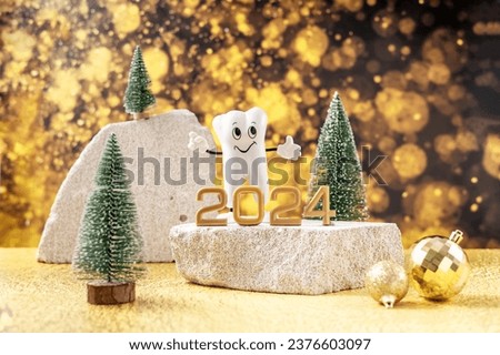 cartoon model of a tooth, the numbers 2024 on a podium made of stone and Christmas trees on a background of golden bokeh