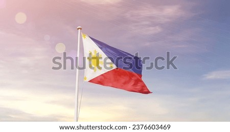 Philippines national flag waving in beautiful sky. The flag waving with dynamic angle.