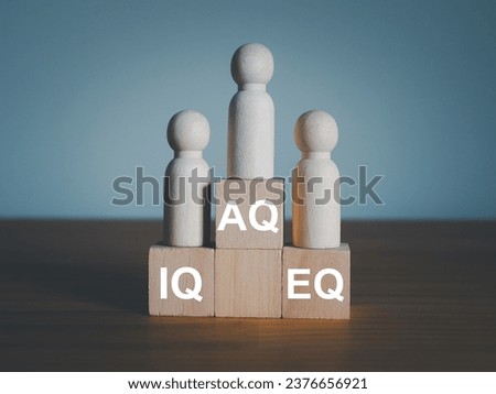 IQ, EQ and AQ Intelligence quotient on wooden blocks