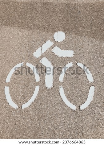 Bicycle path symbol on concrete road
