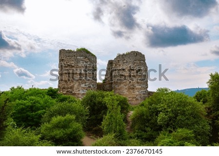 Yoros Castle and trees with cloudy sky. Ruins of a castle in Istanbul. Visit istanbul background photo.