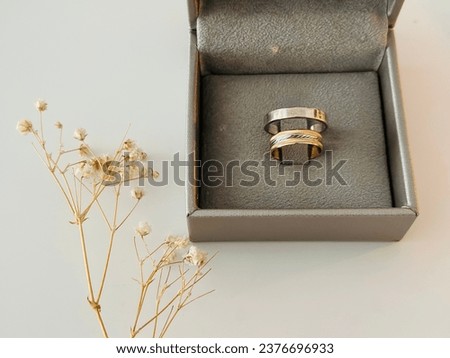Wedding rings on box with white Background