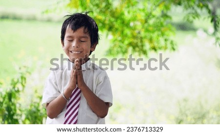 Little boy praying in the morning. Little asian kid hand praying, Hands folded in prayer concept for faith, spirituality and religion. kid child boy with faith and trust