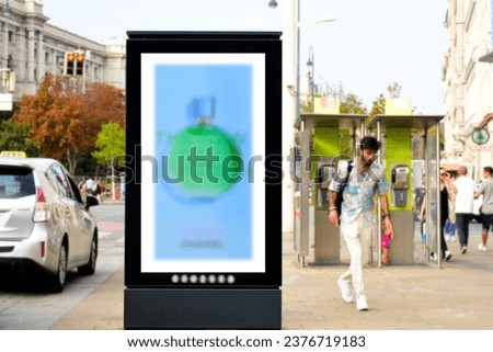 blank lightbox ad panel along sidewalk. outdoor advertising sign panel. parked cars. pedestrians walking by. poster, advertising outdoor sign. mockup base. business communication placeholder template