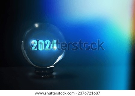 New year 2024 displayed glass ball , year planing, shiny 2024 glitter light glass ball ,2024 life prediction, good and happiness magic year, Life manifesting background Royalty-Free Stock Photo #2376721687