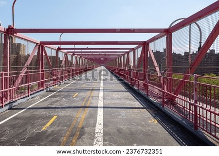 Photo of the cycling and pedestrian section of the Williamsburg Bridge in New York City.