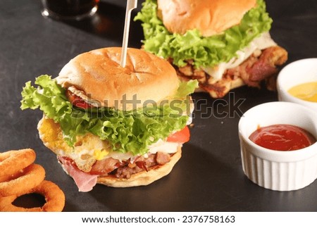 traditional fast food burger and fries and churros