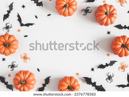 The image showcases a festive Halloween-themed layout with bright orange pumpkins evenly placed on a white background. Each pumpkin has a distinctive, glossy appearance, suggesting freshness.