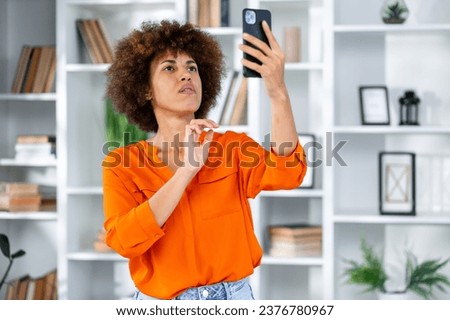 Bad, signal and phone call by woman in office with internet, delay or glitch. Poor, connection and female worker searching for reception on smartphone with issue, problem or tech error Royalty-Free Stock Photo #2376780967