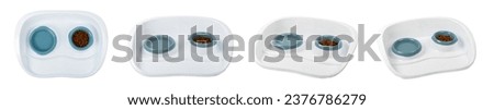 Dry cat food in a bowl isolated on a white background. Vitamins and nutrients for good health and energy in pets.