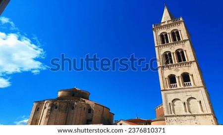 Croatian Landscape: Zadar (Zara) cityscape, Roman forum, Cathedral of St. Anastasia, Roman column, fortified walls, details and views of the ancient city. Summer season