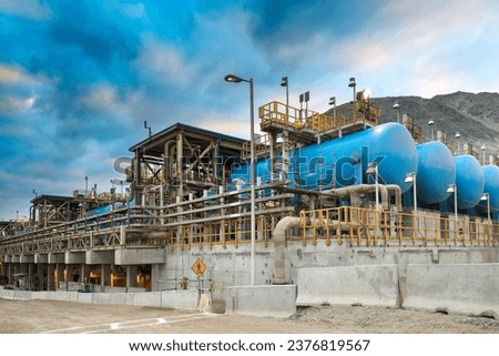 Water tanks and reverse osmosis equipment in a desalination plant. Royalty-Free Stock Photo #2376819567