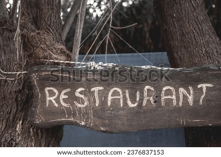 restaurant word on the wooden board