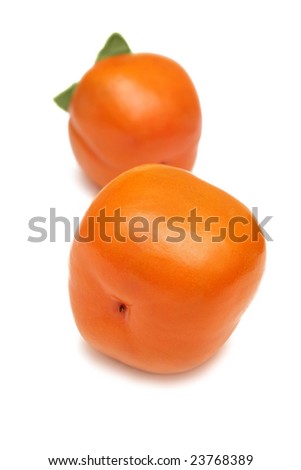 Orange persimmons isolated on white.