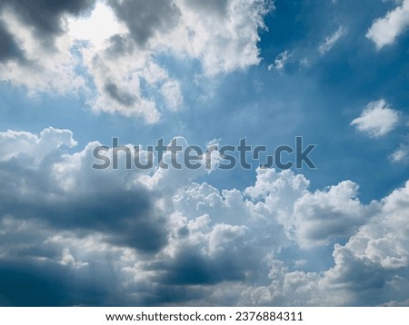 Stratocumulus clouds a mix of stratus clouds and cumulus clouds with blue sky background at Bangkok, Thailand.no focus