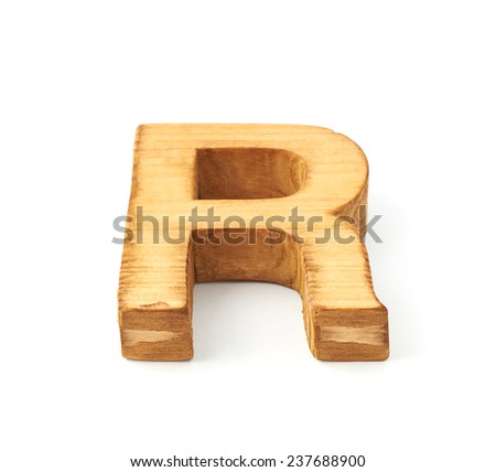 Single capital block wooden letter R isolated over the white background