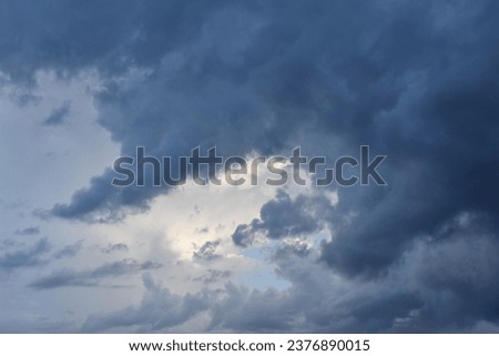 Moody Clouds with Blue Spot over Apache Junction, Arizona