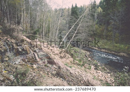 mountain river with rocks and sandstones and reflections - retro, vintage style look