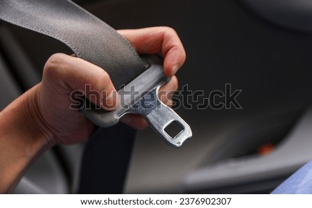 seat belt and buckle, symbolizing safety and accident prevention, a powerful image against drunk driving and promoting responsible habits Royalty-Free Stock Photo #2376902307