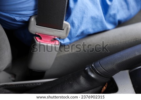 seat belt and buckle, symbolizing safety and accident prevention, a powerful image against drunk driving and promoting responsible habits Royalty-Free Stock Photo #2376902315