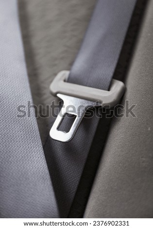 seat belt and buckle, symbolizing safety and accident prevention, a powerful image against drunk driving and promoting responsible habits Royalty-Free Stock Photo #2376902331