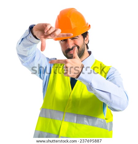 Worker focusing with his fingers