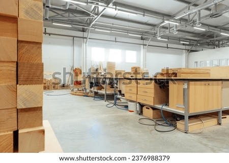 Interior of large workshop of contemporary furniture factory Royalty-Free Stock Photo #2376988379